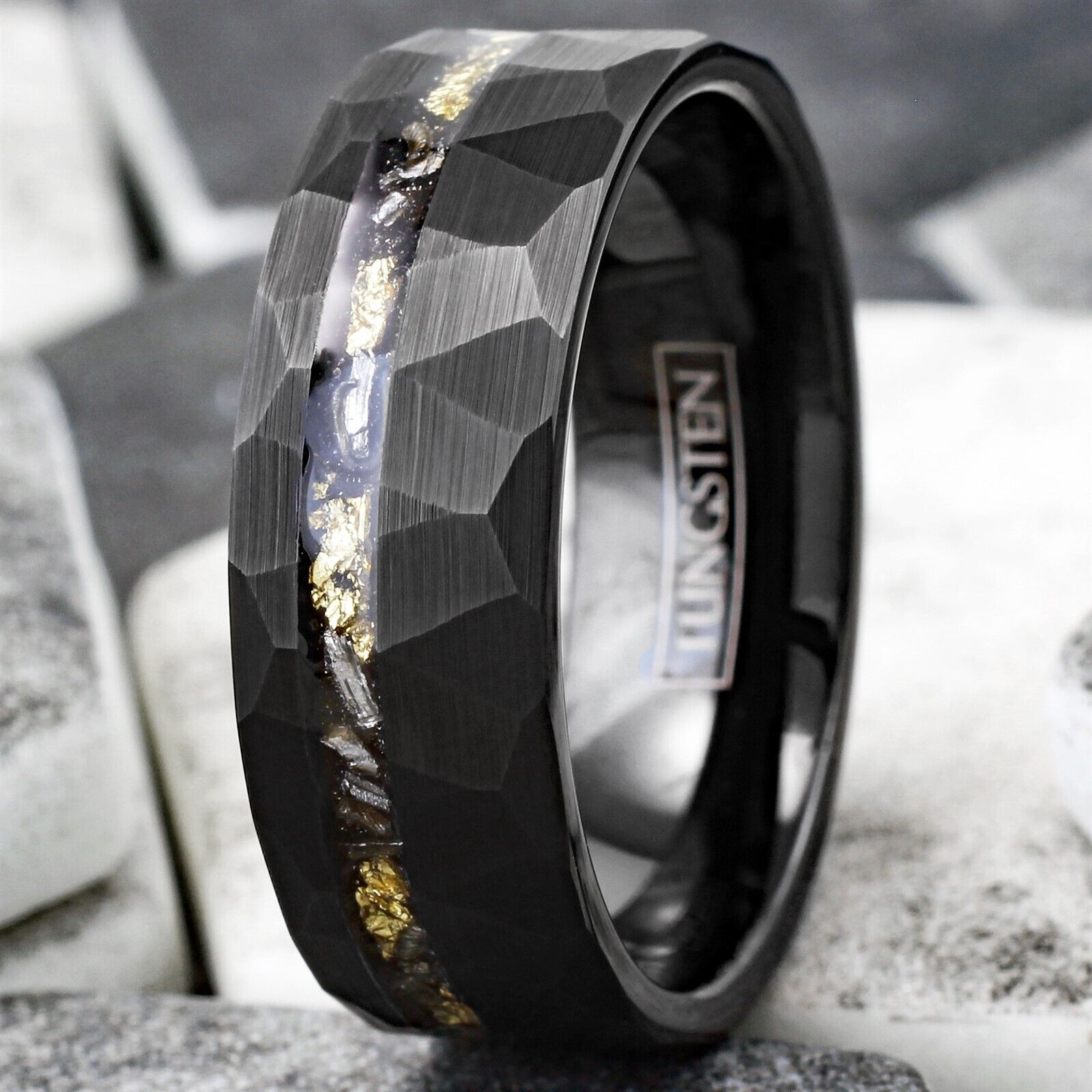 https://www.925express.com/cdn/shop/files/Awesome-Faceted-Brushed-Black-Tungsten-Carbide-Flat-Band-Ring-with-Off-Center-Gold-Leaf-and-Faux-Black-Meteorite-Inlay-c.jpg?v=1697132442