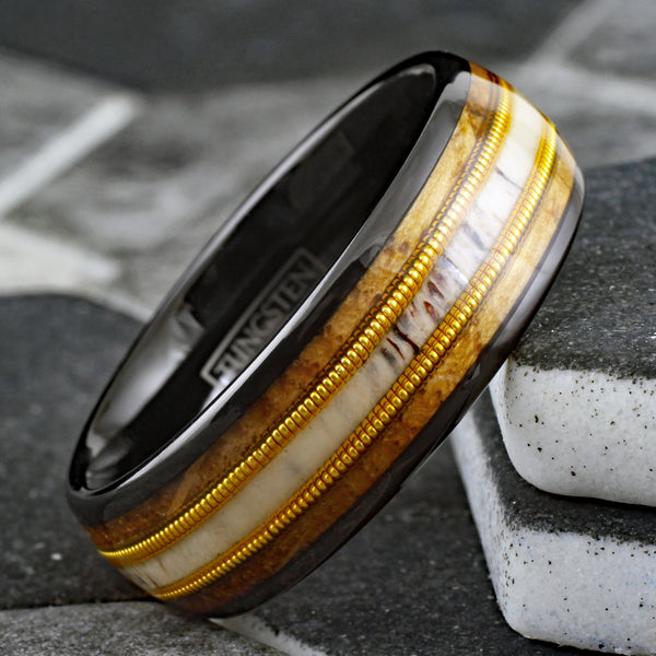 Beautiful Polished Black Tungsten Low Dome Ring with Deer Antler Inlay Between Two Cool Genuine Guitar Strings Surrounded By Whiskey Barrel Oak Wood Inlays.