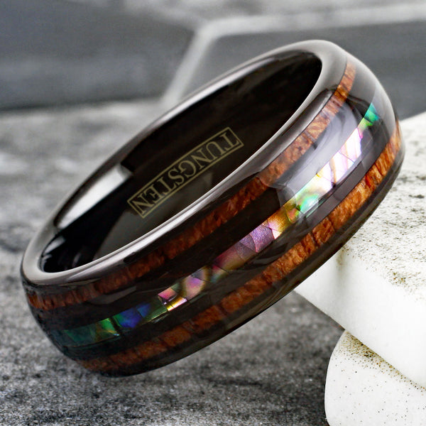 Brilliant Polished Black Tungsten Low Dome Ring with Iridescent Abalone Inlay Between Two Black Bands And Koa Wood Inlays.