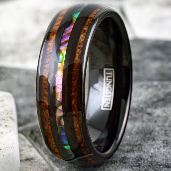 Brilliant Polished Black Tungsten Low Dome Ring with Iridescent Abalone Inlay Between Two Black Bands And Koa Wood Inlays.