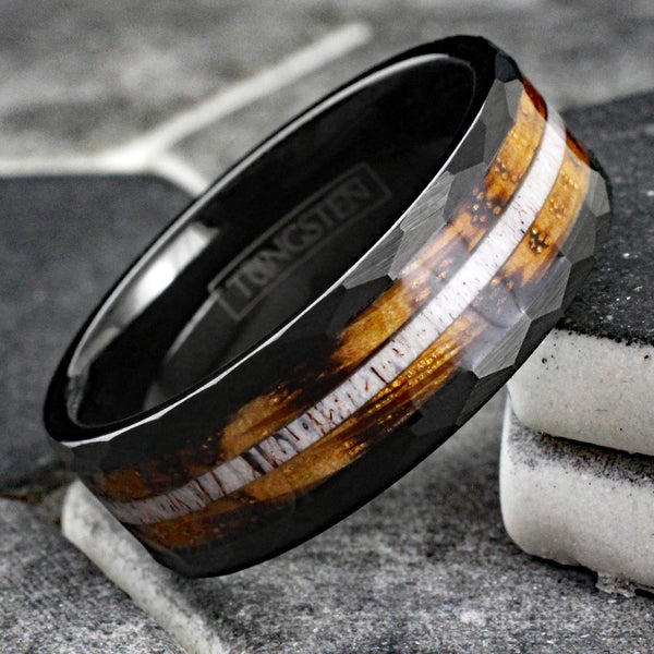 Sublime Faceted Brushed Finish Black Tungsten Flat Band Ring with Deer Antler Inlay Between Whiskey Barrel Oak Wood Inlays.