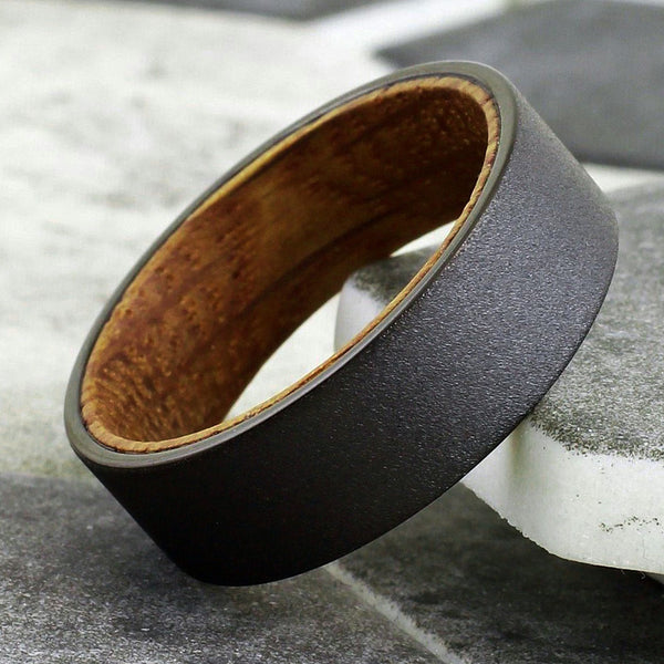 Charming Rough Brushed Distressed Sandblast Finish Flat Band Black Tungsten Ring with Whiskey Barrel Oak Wood Inner Band Sleeve.