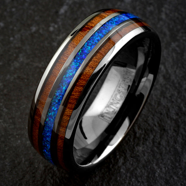 Stunning Polished Gunmetal Gray Tungsten Low Dome Ring with Iridescent Man-Made Crushed Hawaii Blue Opal Inlay Between Two Koa Wood Inlays.