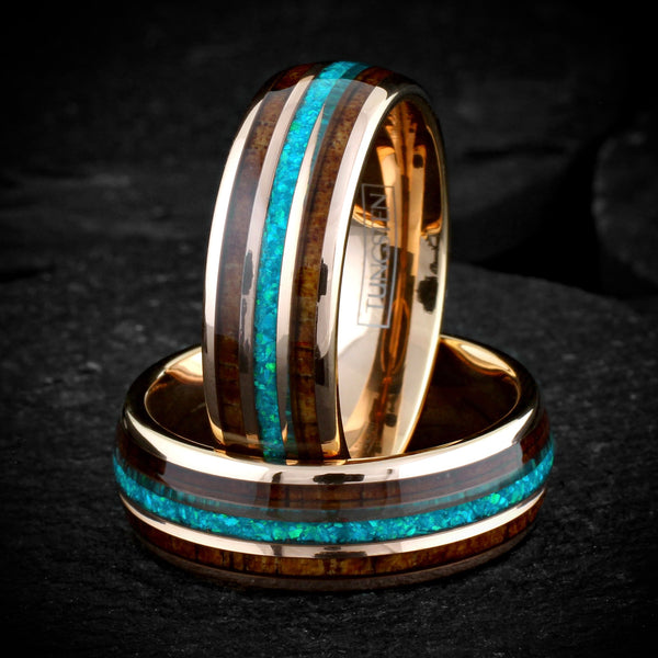Dazzling Polished Rose Gold Tungsten Low Dome Band Ring with Iridescent Man-Made Crushed Hawaii Blue Opal Inlay Between Two Koa Wood Inlays.