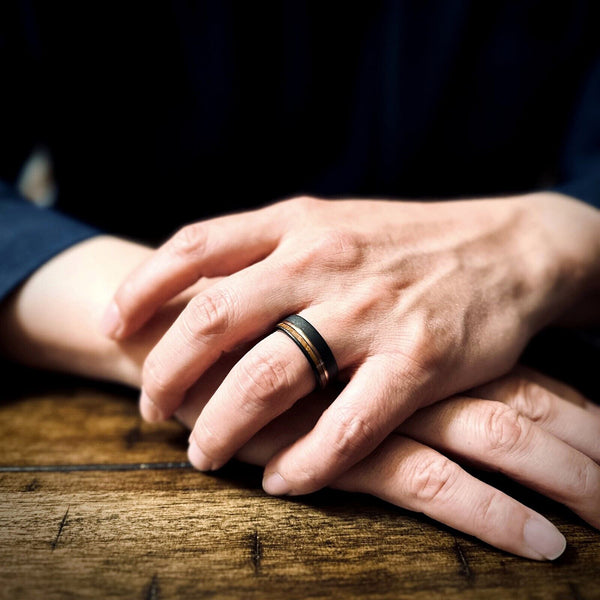 Awesome Sand Finish Black Flat Band Tungsten Ring With Asymmetrical Rose Gold Stripe And Whiskey Barrel Oak Wood Inlay.