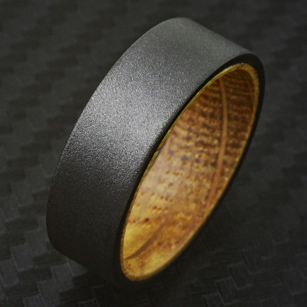 Charming Rough Brushed Distressed Sandblast Finish Flat Band Black Tungsten Ring with Whiskey Barrel Oak Wood Inner Band Sleeve.