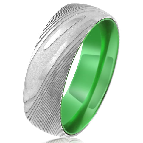 Damascus steel band ring w/ lime green anodized aluminum inner band sleeve | Tilted photo