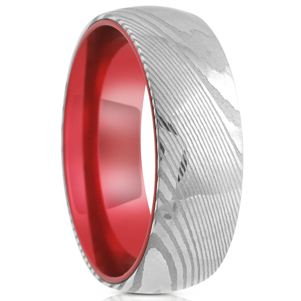 Damascus steel band ring w/ ruby red anodized aluminum inner band sleeve | Upright photo