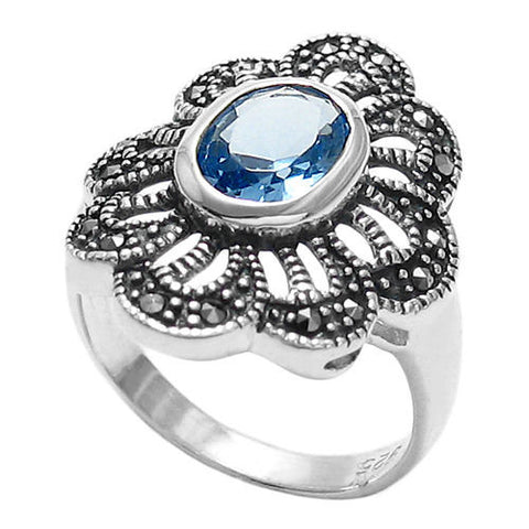 Marcasite flower ring with light blue CZ. Wholesale sterling silver rings. Main photo.