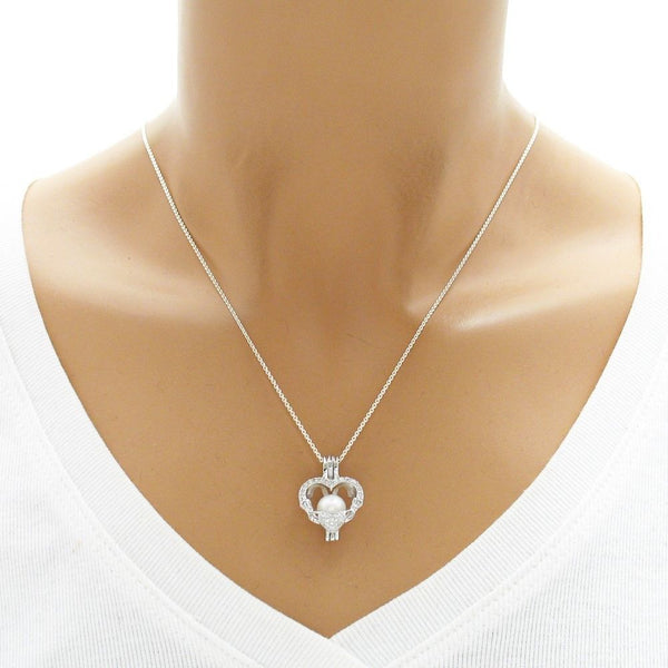 Darling 925 Sterling Silver Claddagh Heart Pearl Cage Pendant with CZ Highlights.