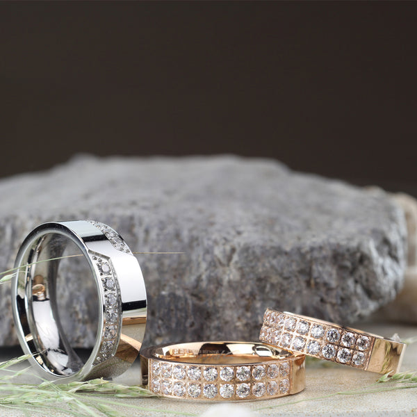 Gorgeous Stainless Steel Rose Gold Band Style Cocktail Ring with Two Rows of Clear CZs.