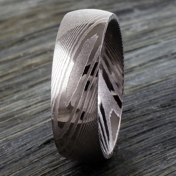 8mm Dome Style Black Damascus steel ring | wholesale Damascus Steel wedding bands & Rings | Upright wood photo