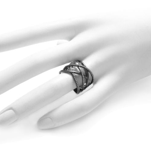 Black sterling silver crisscross ring with stone embellishments. Wholesale sterling silver rings. Hand photo.