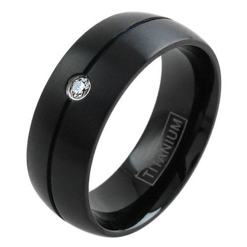 Black titanium channeled ring with a single bezel set CZ | Wholesale Titanium Jewelry | Main photo