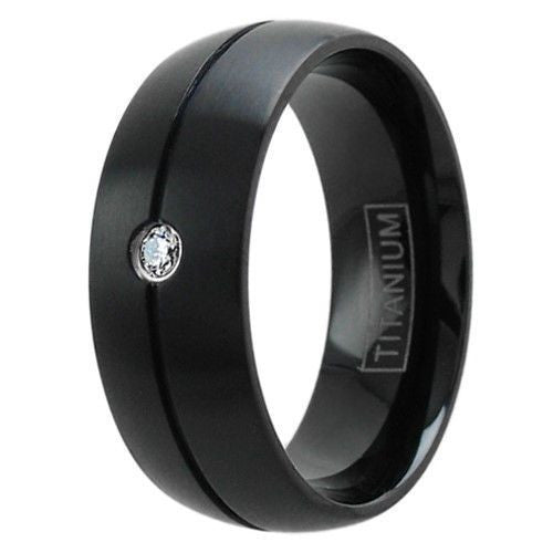Black titanium channeled ring with a single bezel set CZ | Wholesale Titanium Jewelry | Upright photo