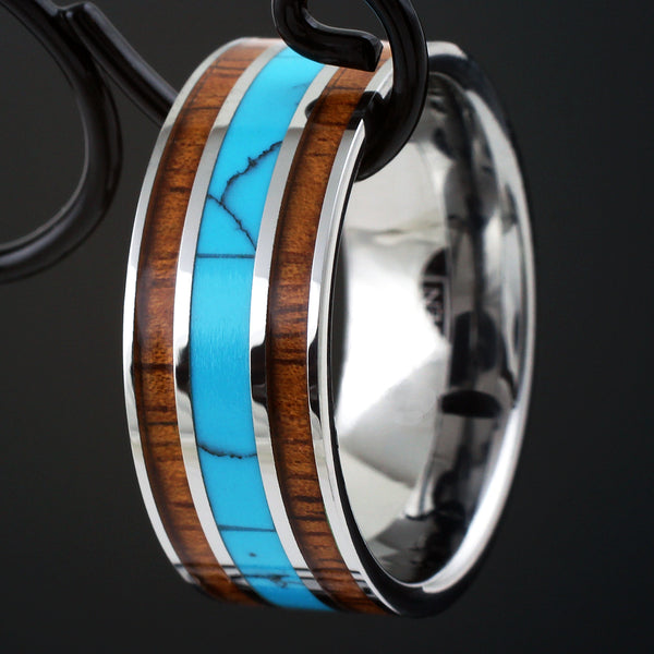 Silver 10mm tungsten ring w/ turquoise inlay between 2 Koa wood inlays | Wholesale tungsten rings - wedding bands | Black photo