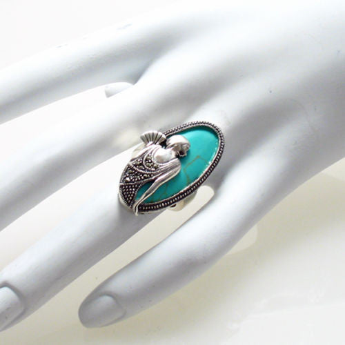 Flapper with fan in turquoise and silver | 35mm | Wholesale sterling silver rings | Hand photo.