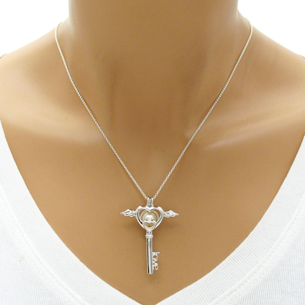 Heavenly Sterling Silver Heart w/ Angel Wings "love" Key Pearl Cage | Wholesale 925 Sterling Silver Jewelry | Mannequin photo