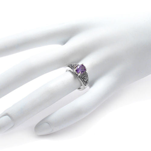 Classic marcasite ring with purple oval CZ stone | Wholesale sterling silver rings | Jewelry | Hand photo