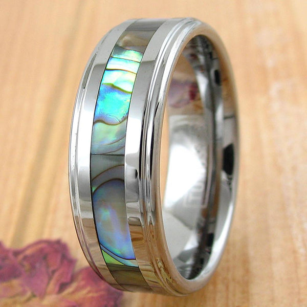 Silver tungsten carbide ring w/ abalone inlay & stepped edges | wholesale tungsten rings - wedding bands | light wood photo