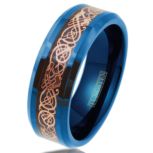 royal blue tungsten carbide band ring w/ rose gold Celtic Dragon on Sapphire blue faux carbon fiber inlay | Tilted photo