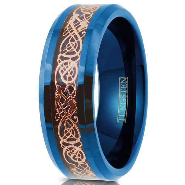 royal blue tungsten carbide band ring w/ rose gold Celtic Dragon on Sapphire blue faux carbon fiber inlay | Upright photo