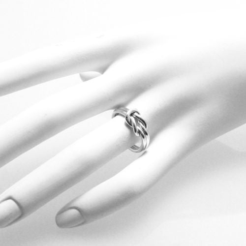 The classic love-knot ring, beautiful in its simplicity. Wholesale Sterling Silver Rings. On hand.