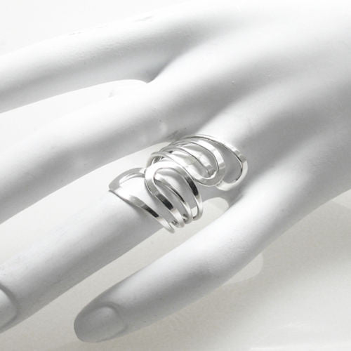 Beautiful modern wrap around ring with a butterfly wing motif. Wholesale Sterling Silver Rings. On hand.