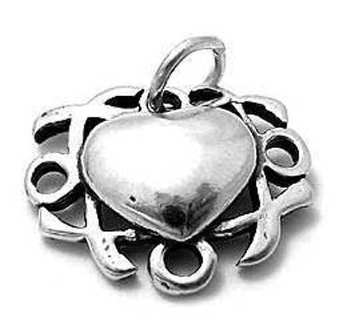 Heart Surrounded with XOXO's Charm. Sterling Silver