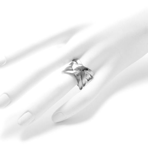 Elegant criss-cross ring in an up to the minute design. Wholesale Sterling Silver Rings. On hand photo.