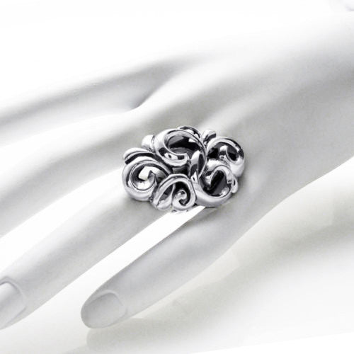 Flowing lines and sharp angles depict force of the tempest. Wholesale Sterling Silver Rings. On hand.