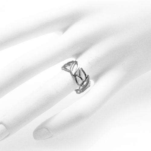 Beautiful cutout ring of olive leaves to symbolize peace. Wholesale sterling silver rings. On hand.
