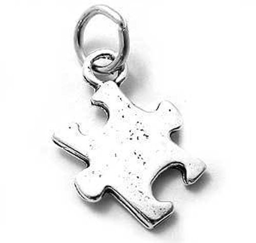 Puzzle Piece Charm. Sterling Silver