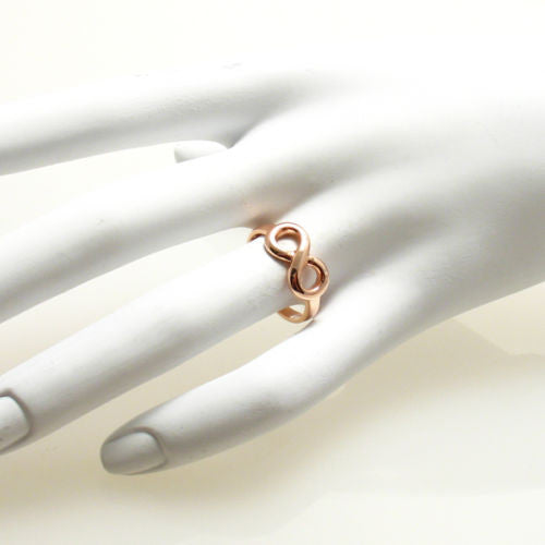 Graceful yet modern, a symbol of eternal connection. Rose gold. Wholesale Sterling Silver Rings. On hand.