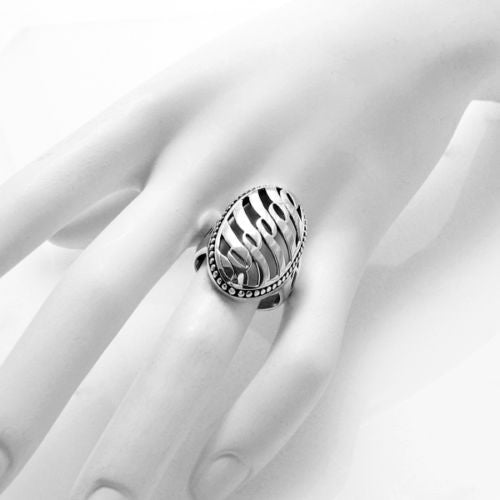 Ring of Individual blades of grass interlaced at its tips. Wholesale sterling silver rings. On hand.